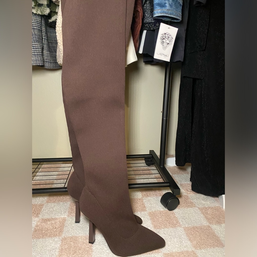Brown over the knee sock boot.